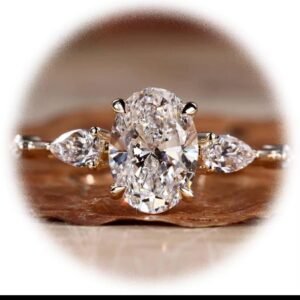 Oval Centre Stone Lab Diamond with Pear Shape Stones Either Side